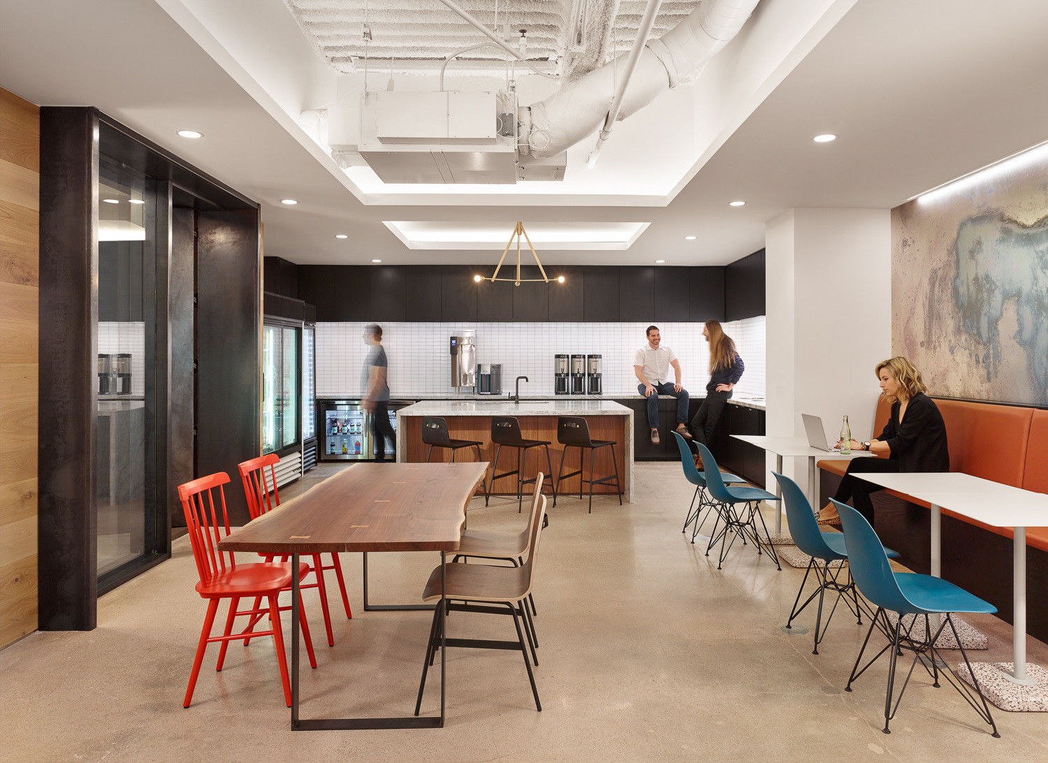 Café tables and seating in Dropbox’s Austin office